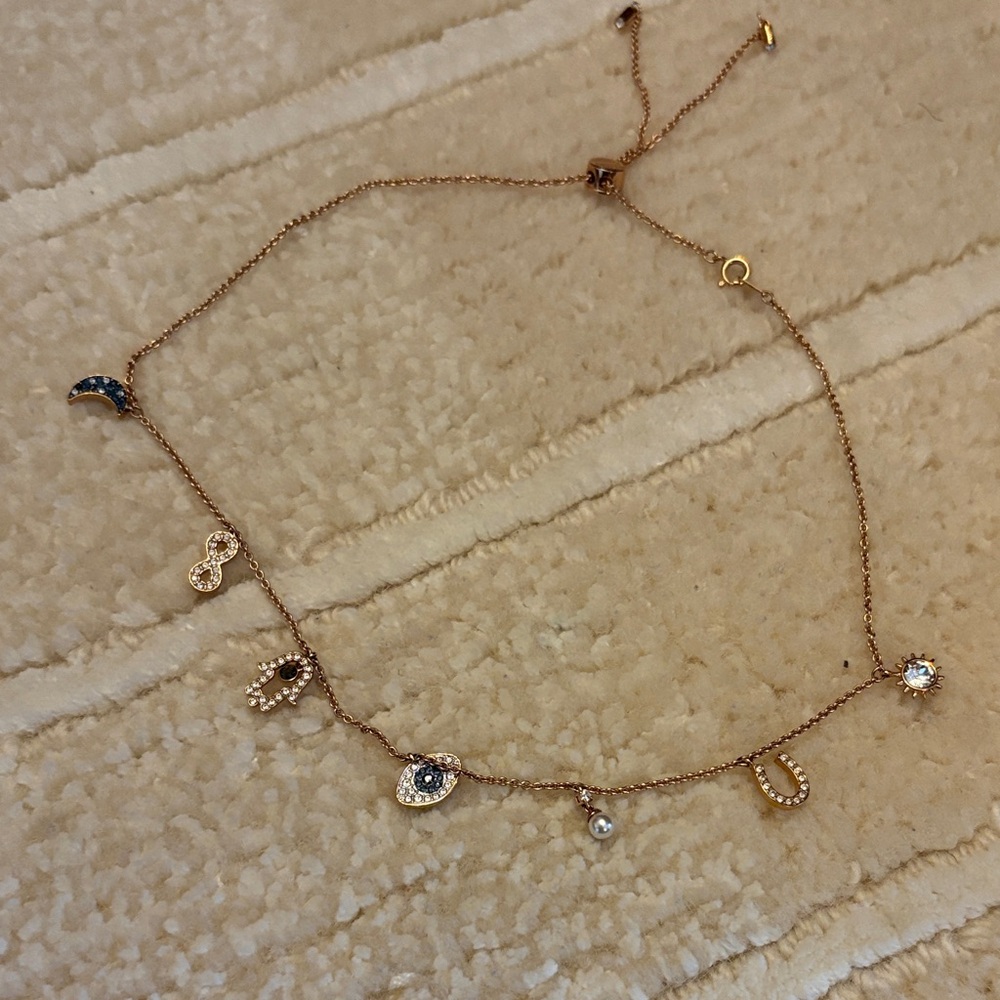 Swarovski rose gold good luck charm adjustable necklace- new in box never worn